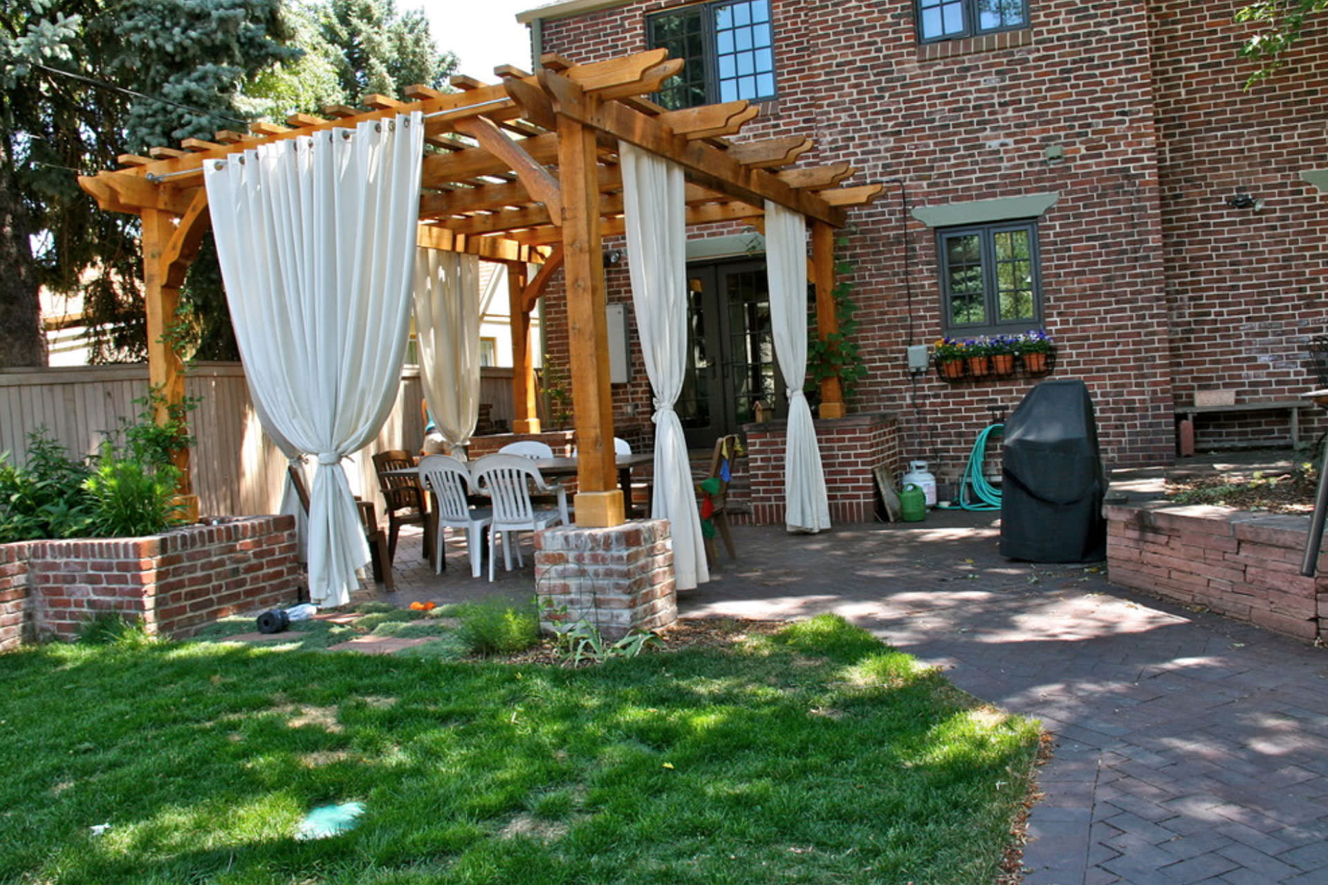 Pergola with White Curtains